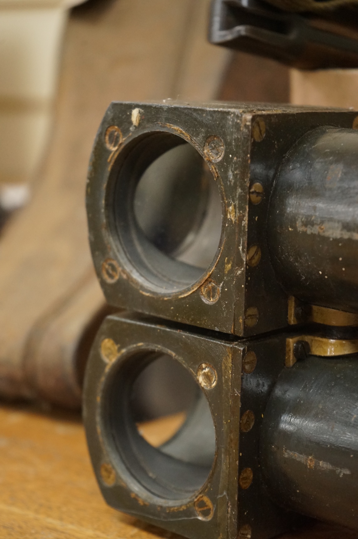 A collection of militaria including; a US Air Force camera Type N-6, a leather cased Bell & Howell Sportster camera and accessories, a pair of periscope binoculars, a leather cased compass by Goerz, Berlin